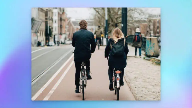 Men and women riding hybrid bikes on a bike lane