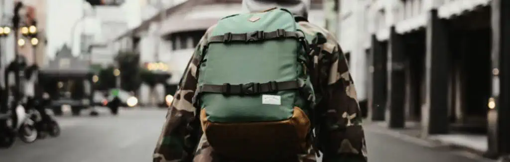 A cycling backpack on a commuter's back. 